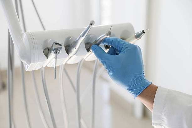 Professional Tooth Extraction technician working in Howe, TX